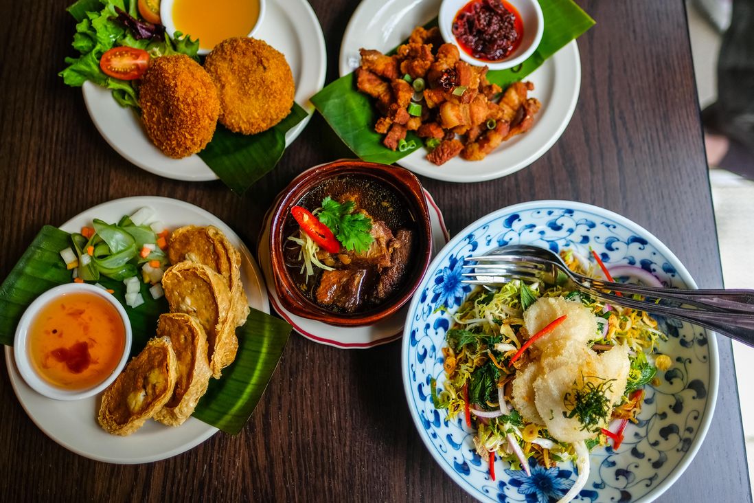 Images of food and decor in a Thai restaurant